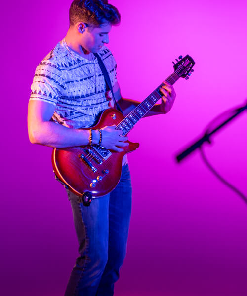 guitarist on purple